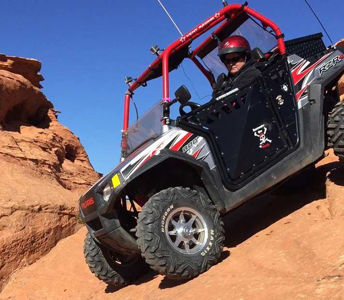 Jan driving here RZR on the Moab slick rock its very steep